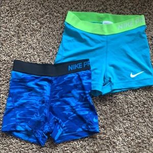LOT 2 Nike spandex shorts.